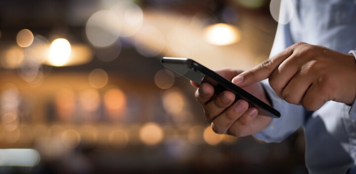 Man using a mobile device