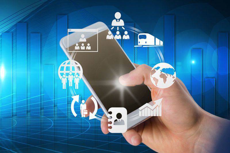 Hand using mobile phone with icons showing connectivity